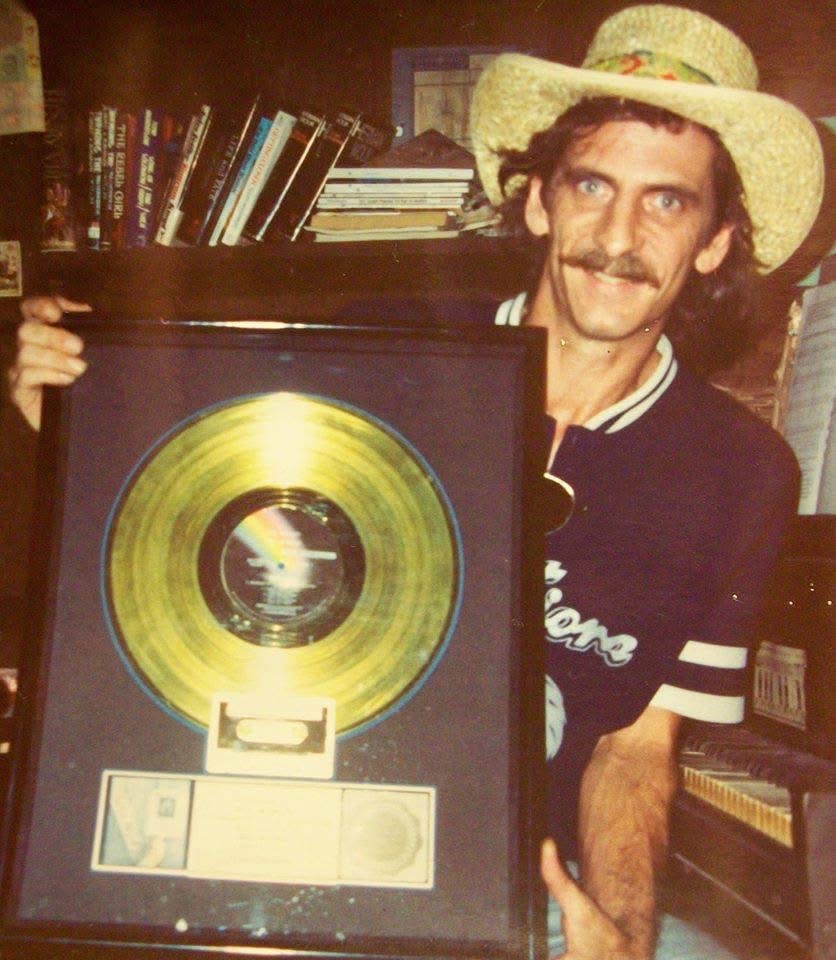 Michael McGeary with gold record for ¡Viva Terlingua!